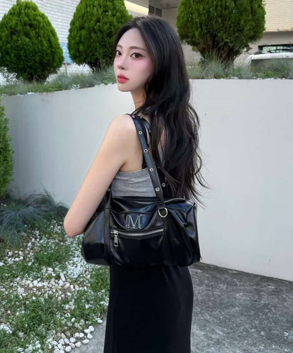 MUCENT Nox Metal Logo Eyelet Strap Shoulder Bag