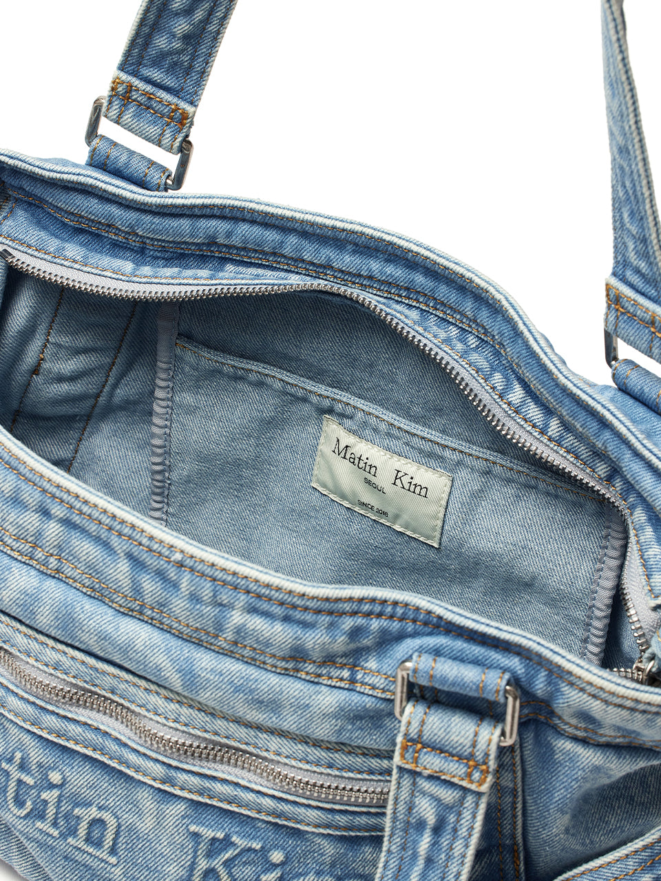 MATIN KIM WASHED DENIM SQUARE BAG IN LIGHT BLUE